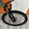 M003-green-spoked-front-wheel